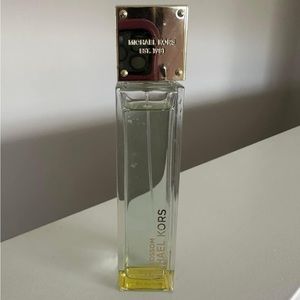 Only used couple times Michael Kors Sky Blossom perfume